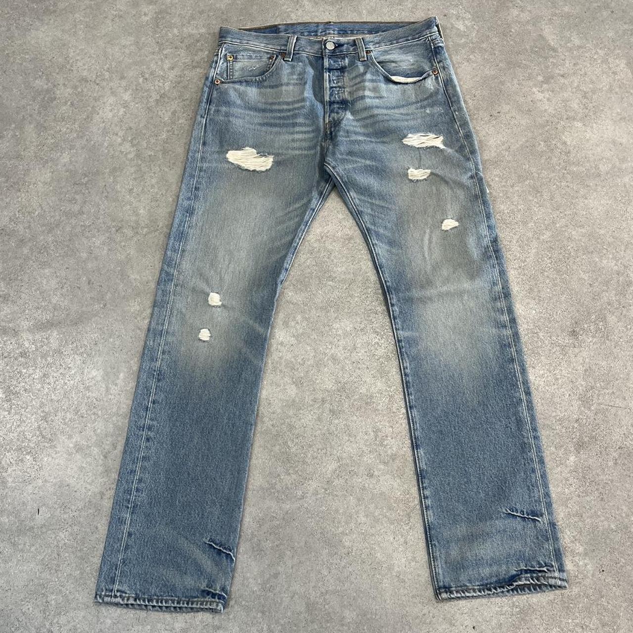 Levi’s 501 Distressed Light Wash Denim Jeans