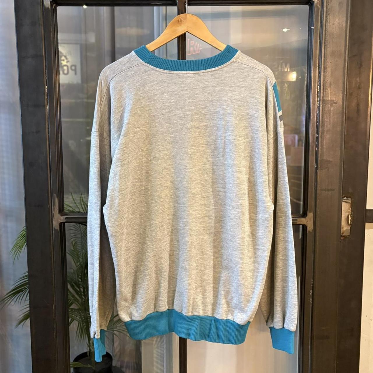 Vintage Retro Essential Grey Puma Crewneck Jumper Sweatshirt with embroidered logo and diagonal Teal and Pink Side Stripe #90s #sportswear #essential #y2k #puma
