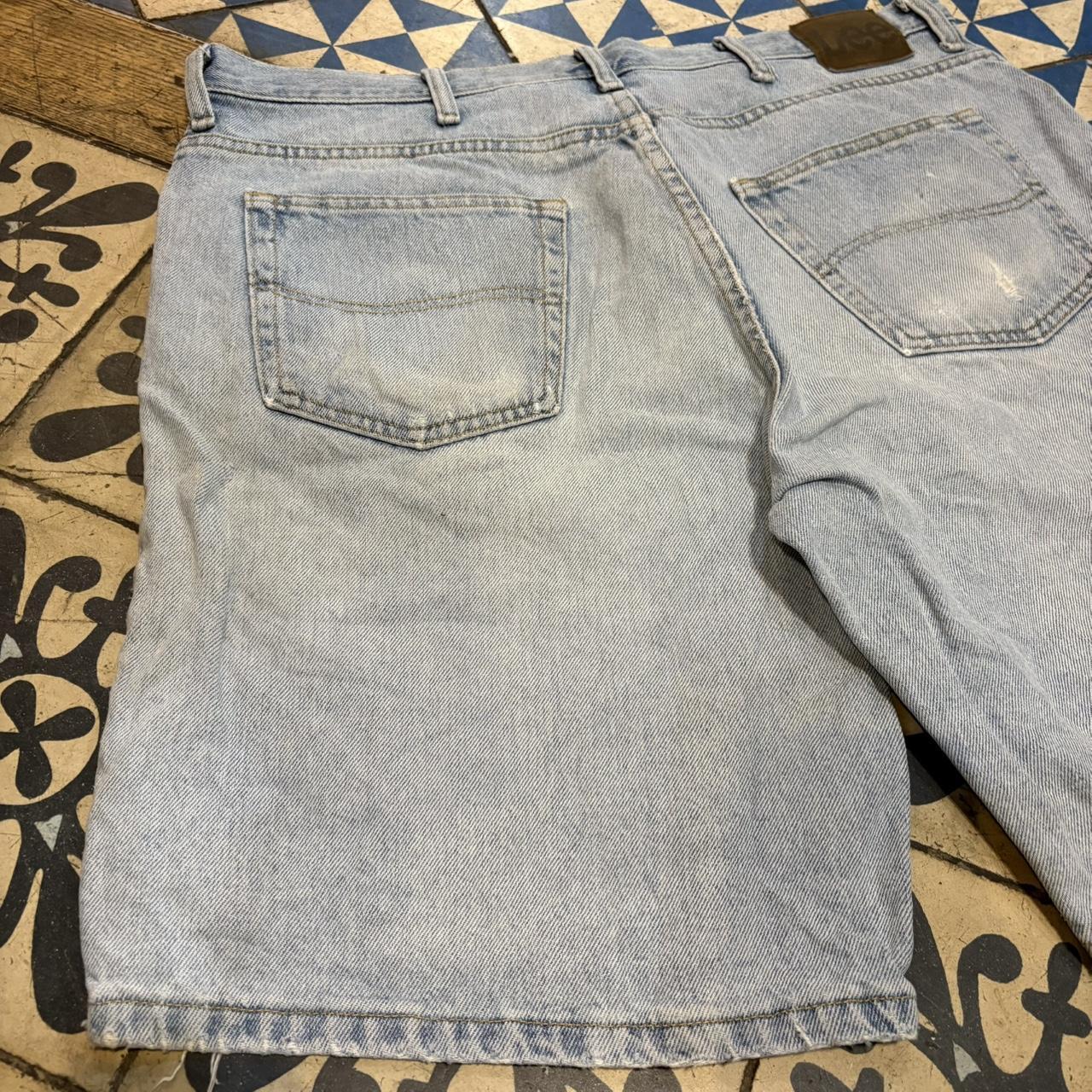 JRT104 - Vintage Retro Essential Wrangler Blue Light Wash Distressed Denim Shorts Jorts with detailed patch Logo carpenter workwear #hiphop #90s #jorts #skater #wrangler