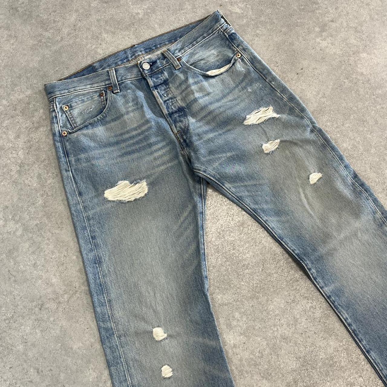 Levi’s 501 Distressed Light Wash Denim Jeans