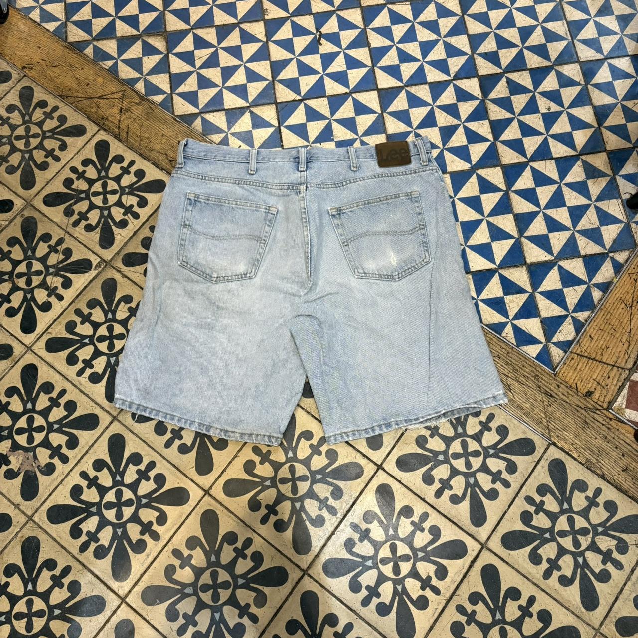 JRT104 - Vintage Retro Essential Wrangler Blue Light Wash Distressed Denim Shorts Jorts with detailed patch Logo carpenter workwear #hiphop #90s #jorts #skater #wrangler