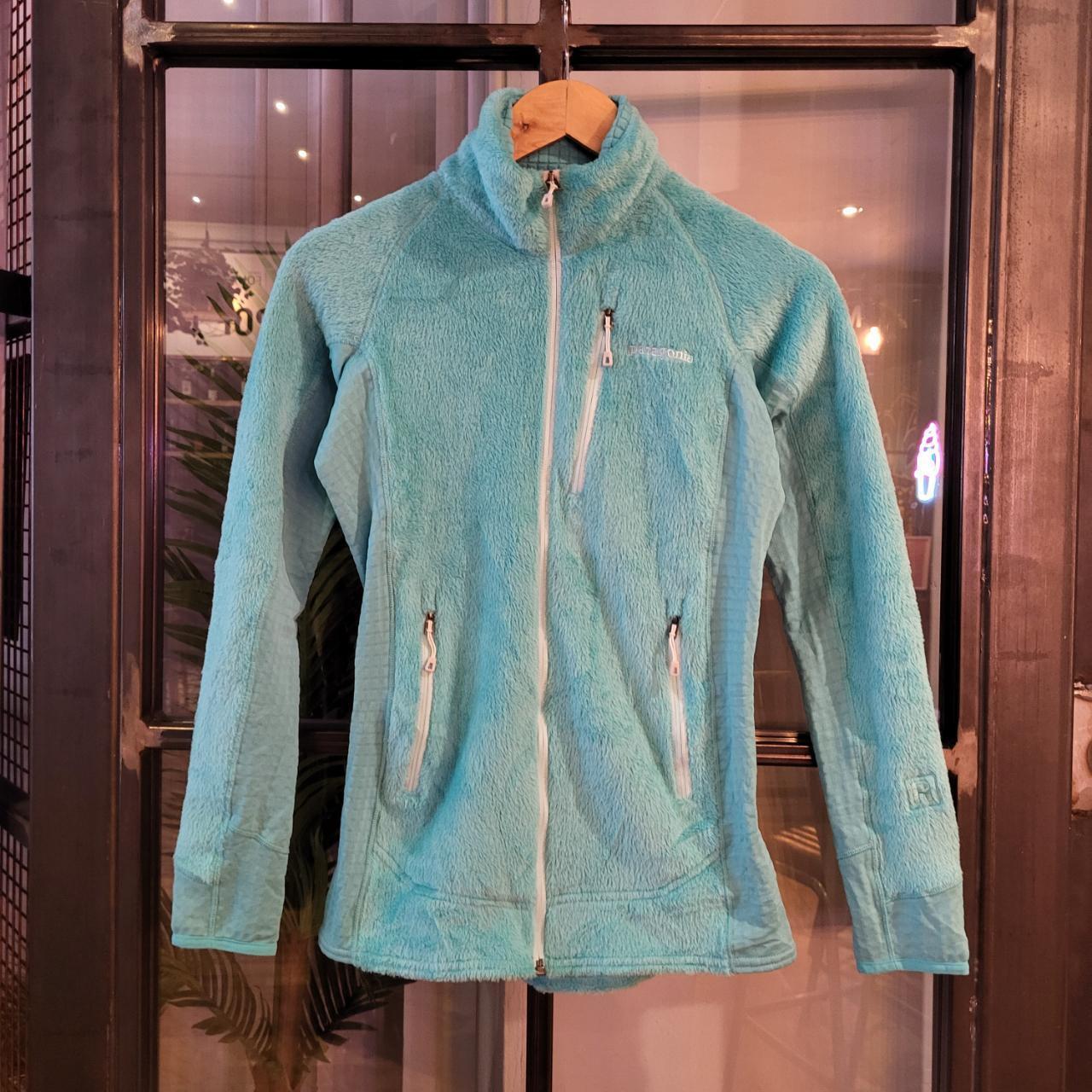 Vintage essential retro Aztec funky geometric tribal block pattern light blue turquiose Patagonia snap T popper quarter zip synchilla fleece sweatshirt pullover with small spellout logo as seen