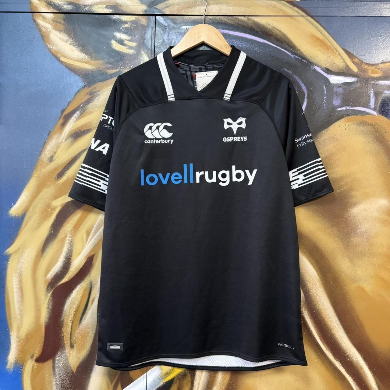 Canterbury Ospreys 2017 - 18 Home Black Collared Rugby Short Sleeve Jersey with embroidered logos and lovellrugby, RNA, Swansea University, morganstone and dezrezlegal printed sponsorships