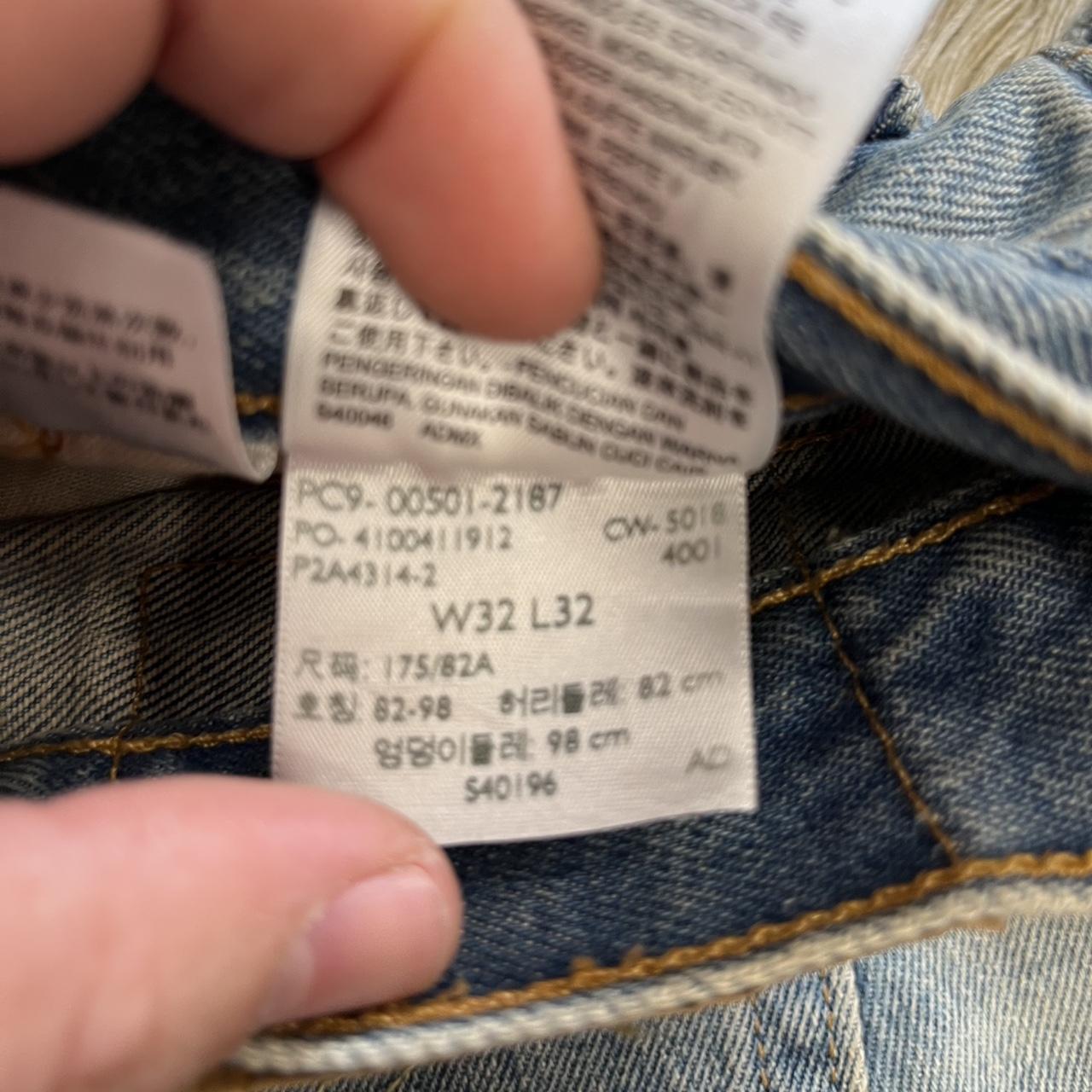 Levi’s 501 Distressed Light Wash Denim Jeans