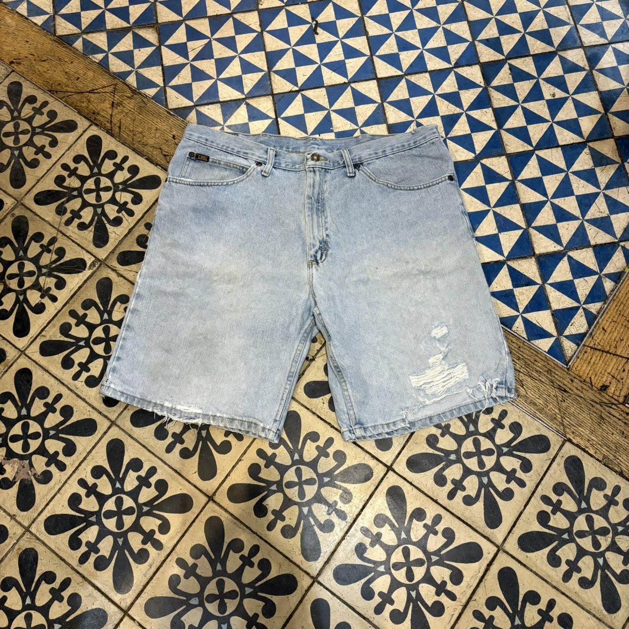 JRT104 - Vintage Retro Essential Wrangler Blue Light Wash Distressed Denim Shorts Jorts with detailed patch Logo carpenter workwear #hiphop #90s #jorts #skater #wrangler