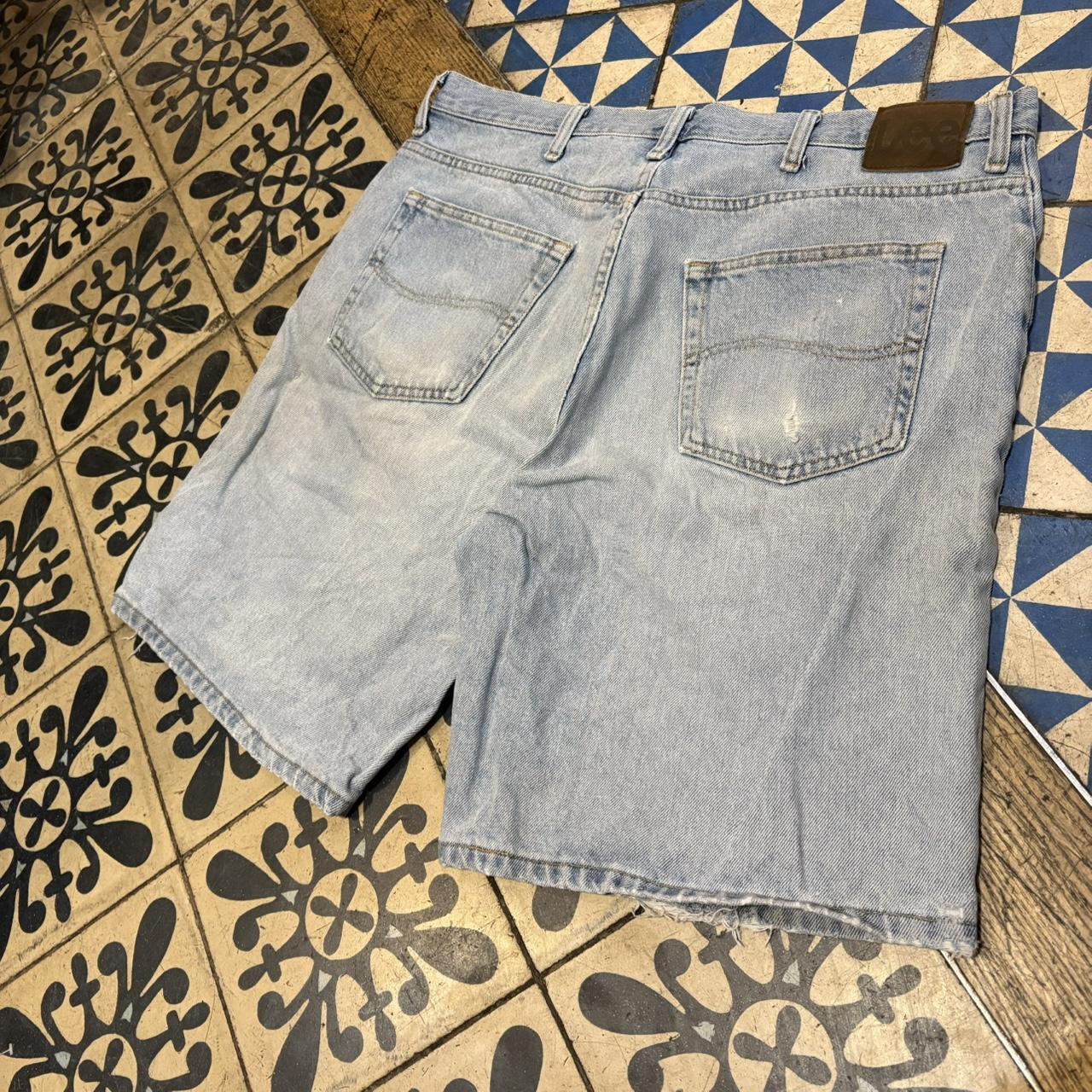 JRT104 - Vintage Retro Essential Wrangler Blue Light Wash Distressed Denim Shorts Jorts with detailed patch Logo carpenter workwear #hiphop #90s #jorts #skater #wrangler